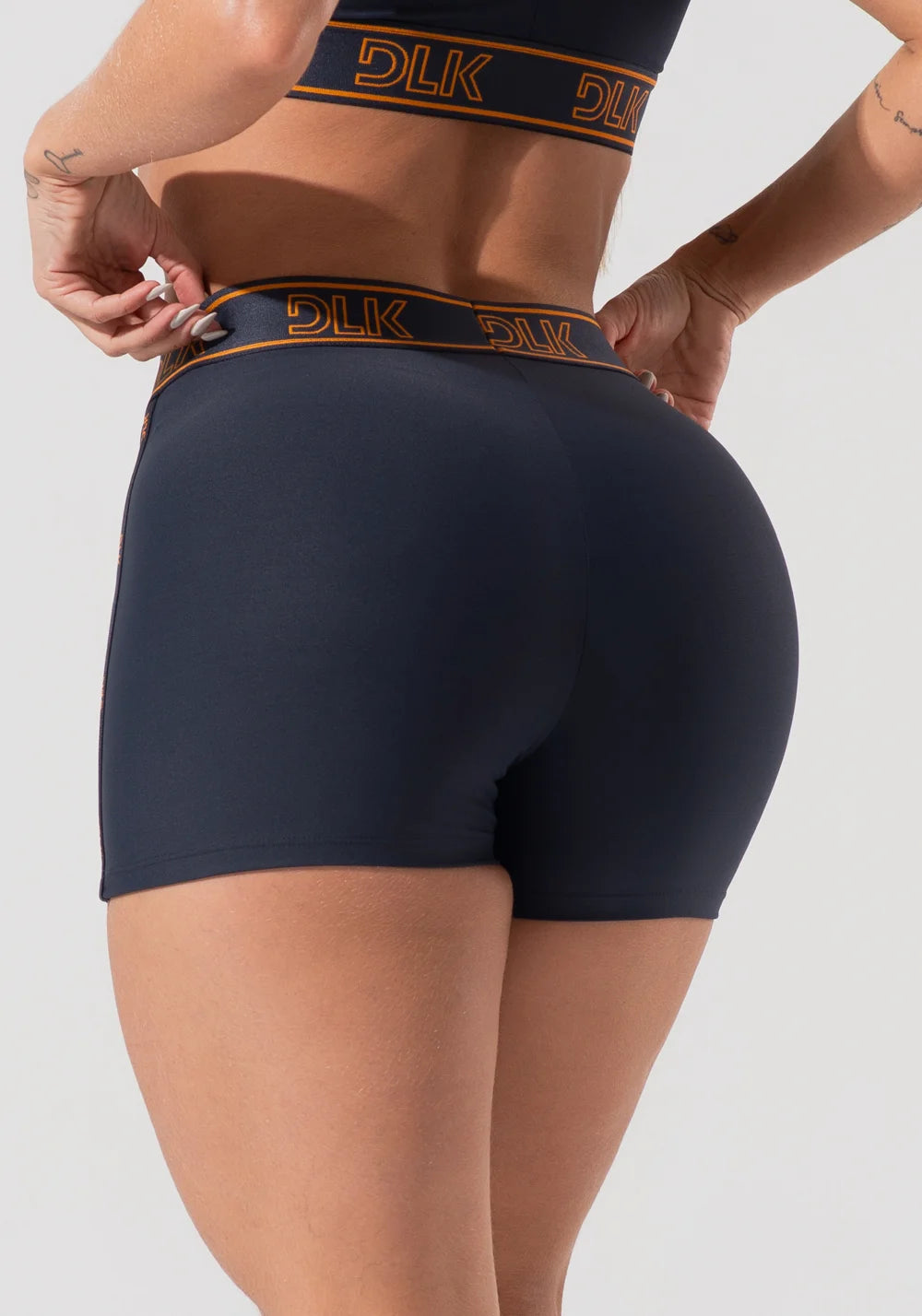 Conjunto Fitness Top com bojo + Shorts DLK Cor: Grafite/Caramelo